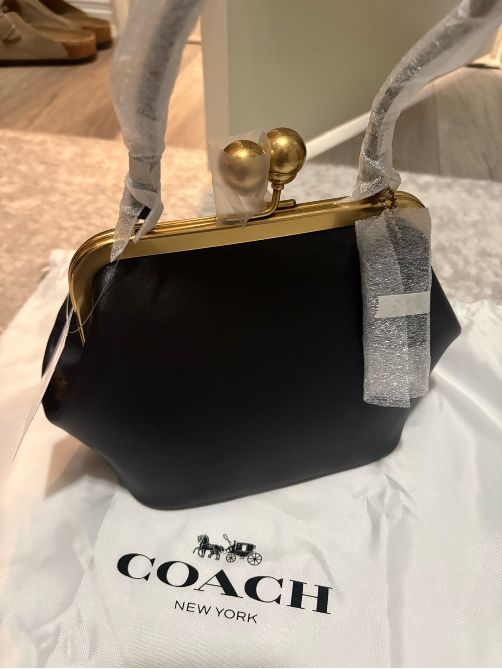 Coach Black Leather Kiss-Lock Frame Handbag with Gold Hardware